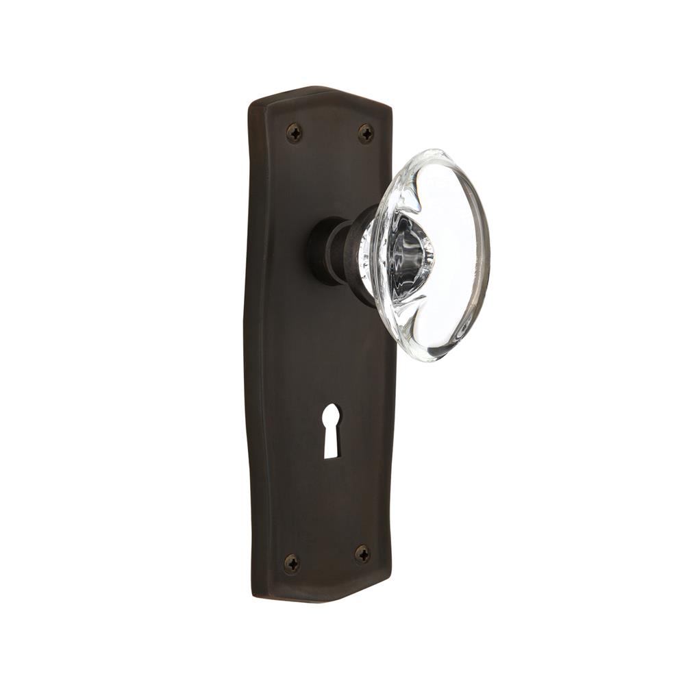Nostalgic Warehouse PRAOCC Passage Knob Prairie Plate with Oval Clear Crystal Knob with Keyhole in Oil Rubbed Bronze